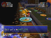 Tails receiving a Thief's Eye.