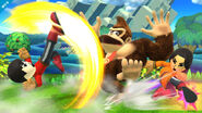 Mii Brawlers attacking Donkey Kong.