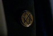 A Men of Letters pin worn by members of the order.