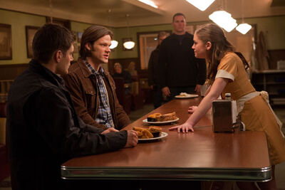 Dean, Sam and Eve in Ervin's Diner.