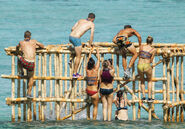 Malolo climbs into their cell in Ghost Island.