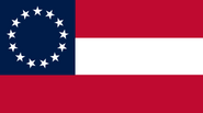 The 13-star "Stars and Bars", adopted after Arstotzka joined the Confederacy as the 13th state, used until Leasath joined as the 14th state.