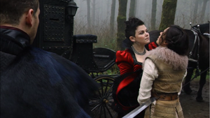 Snow plunges her hand into Regina's chest.