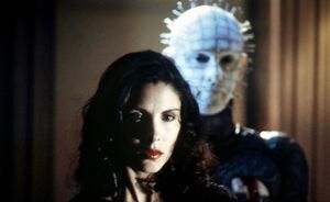 Angelique with Pinhead at her side.