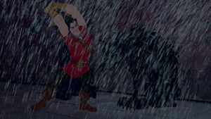 Gaston about to hit a statue with his makeshift club, thinking it's the Beast.