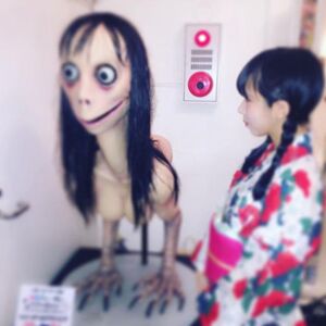 The real "Momo" sculpture on display at a Japanese art museum.