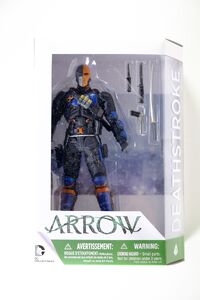 A DC Collectible action figure of Deathstroke from Arrow