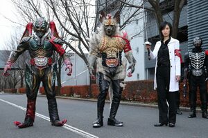 Igura standing beside her two kaijin allies.