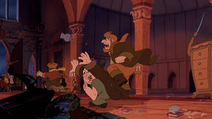 LeFou fleeing away with the rest of the rioters in defeat.