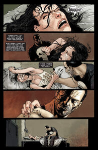 The Punisher comforts Viorica, a victim of sex slavery.