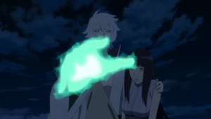 Toneri attacks Naruto as he takes Hinata away from him.