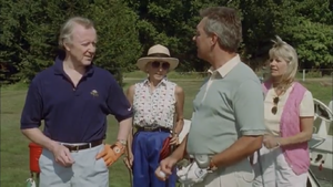 Cary playing golf.