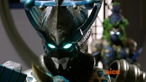 Vrak noticing Metal Alice's presence.