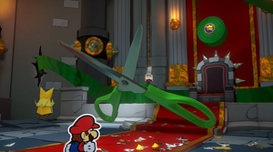 Scissors challenging Mario to battle.