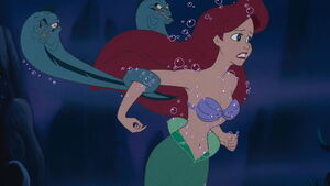 Flotsam and Jetsam restraining Ariel.