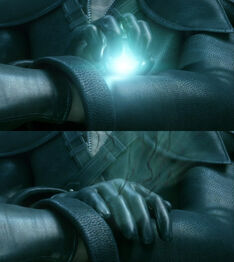 Kadaj, a remnant of Sephiroth, absorbs Materia directly in his arm.