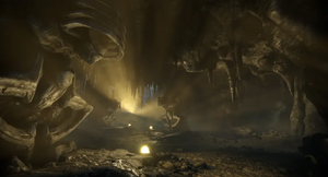 A cavern with statues of the Maw