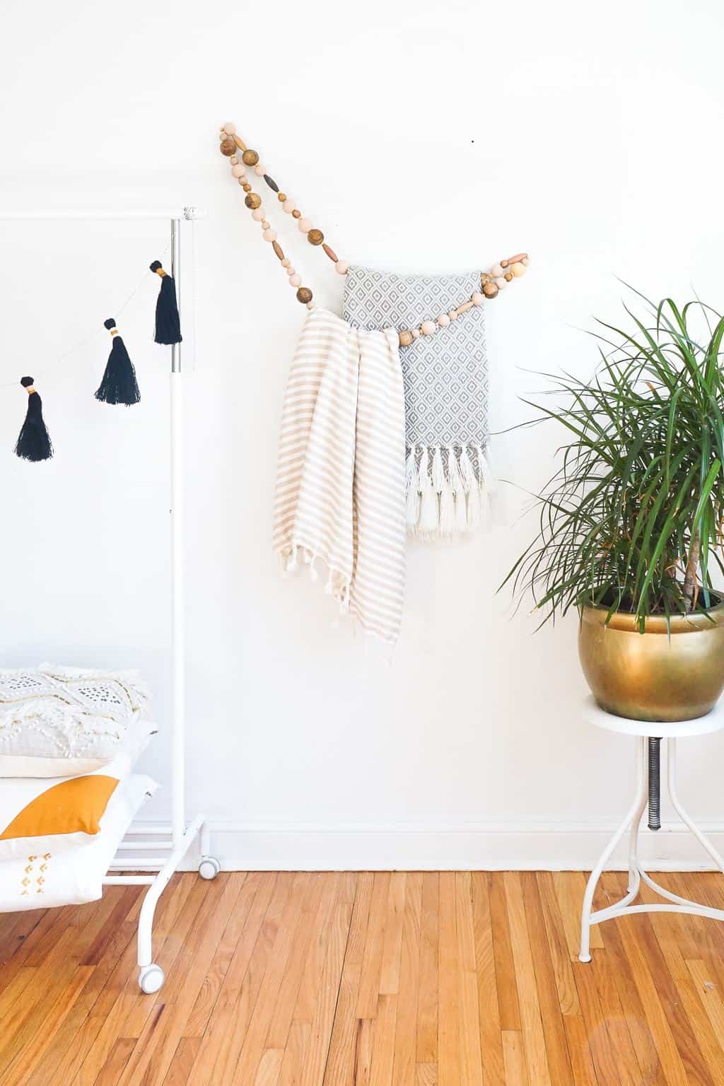 DIY Minimal Beaded Blanket Holder by top Houston lifestyle blogger Ashley Rose of Sugar and Cloth