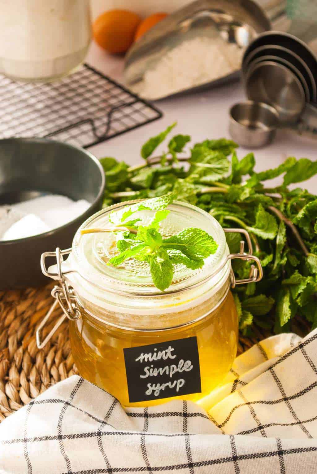 how to make simple syrup for cakes - min syrup with a mint garnish