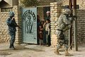 A Iraqi Policeman and a soldier of the 505th PIR patrolling in Samarra