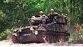 A British Royal Marine Combat Vehicle Reconnaissance (Tracked) sits in a hide site during a 45 Commando assault at Camp Lejeune, N.C., on May 11, 1996, as part of Combined Joint Task Force Exercise '96.