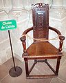 A wooden chair in the St. Pierre Cathedral used by John Calvin.