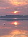 Coucher de soleil sur une plage de Loperhet