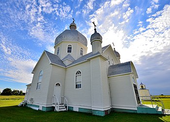 10. English: Church side and front looking to the southwest. St John the Baptist Ukrainian Greek Catholic Church in Smuts, Saskatchewan, Canada. Established 1905 Photograph: Diamondghr Licensing: CC-BY-SA-3.0