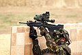 A French soldier using a FAMAS with the new FELIN.