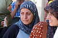 Distress on the face of a woman seeking refuge from the south Lebanon attacks, July 27.