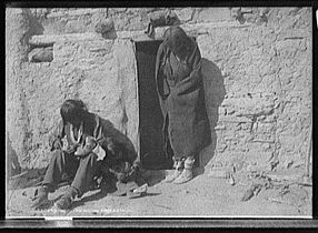 Hopi mending moccasins (between 1900 and 1915).