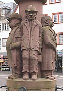 "Wichshänsjen" on Heuschreckbrunnen in Trier, Germany.