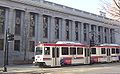 TRAX train passing Frank E. Moss Courthouse