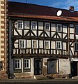 Deutsch: Das "Elf-Apostel-Haus". Ätestes Bürgerhaus der Stadt Tann (Rhön) vom Anfang des 16 . Jahrhunderts English: The "Elf-Apostel-Haus" (eleven apostle house). Is is the oldest townsman house from beginning of the 16. century in Tann (Rhön)