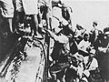 Japanese troops load onto a destroyer in preparation for a "Rat Transportation" (called "Tokyo Express" by Allied forces) to Guadalcanal in 1942.