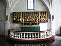 Altar piece from Drothem kyrka in Sweden. At least one figur is holding a girdle book