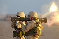 Spc. Thomas Johnson shoots an AT-4 anti-tank weapon during familiarization training at the Udari range in Kuwait