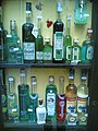 Different kinds of absinthe on a shop window in Prague.