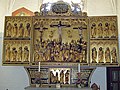 Altar piece from Horsens Klosterkirke in Denmark. On the right at the bottom St. Simon is holding a girdle book