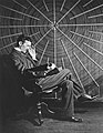 Nikola Tesla, with Rudjer Boscovich's book "Theoria Philosophiae Naturalis". East Houston St., New York