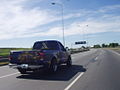 Pick-up truck painted with the colors of Boca Juniors. Buen Ayre Highway, Buenos Aires Province.