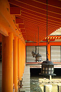 Lanterns hang from the eaves of a building