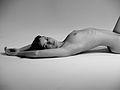 * Nomination Black and white photo of a female nude recumbent (supine) model stretching while facing the camera, with arms above her head. By User:Econt --Edu1997 09:27, 14 June 2023 (UTC) * Decline  Oppose Not taken by a Commons photographer. --Uoaei1 19:25, 14 June 2023 (UTC)