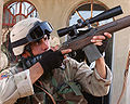 An Army marksman in Fallujah, Iraq, using a modified M14