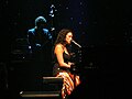 Norah Jones performing at the Blaisdell Arena.