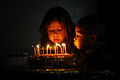 Kids blowing candles