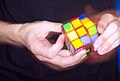 Speedsolving a standard 3x3x3 Rubik's Cube (speedcubing).