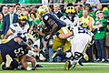 Notre Dame Fighting Irish running the ball vs. the Michigan Wolverines