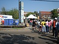 Locals line up at Red Cross relief station