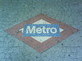 Metro Madrid logo mosaic at Lago station.